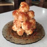 Торт из профитролей Крокембуш с паутинкой из карамели